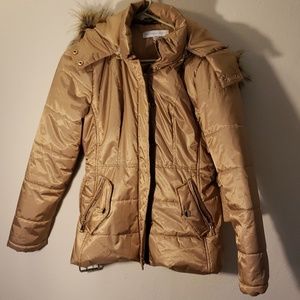 Faux fur lined hooded winter jacket.
